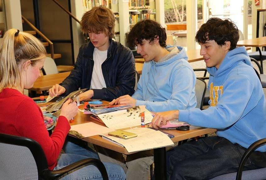 Students work on mood board project during visit by Camryn Garrett