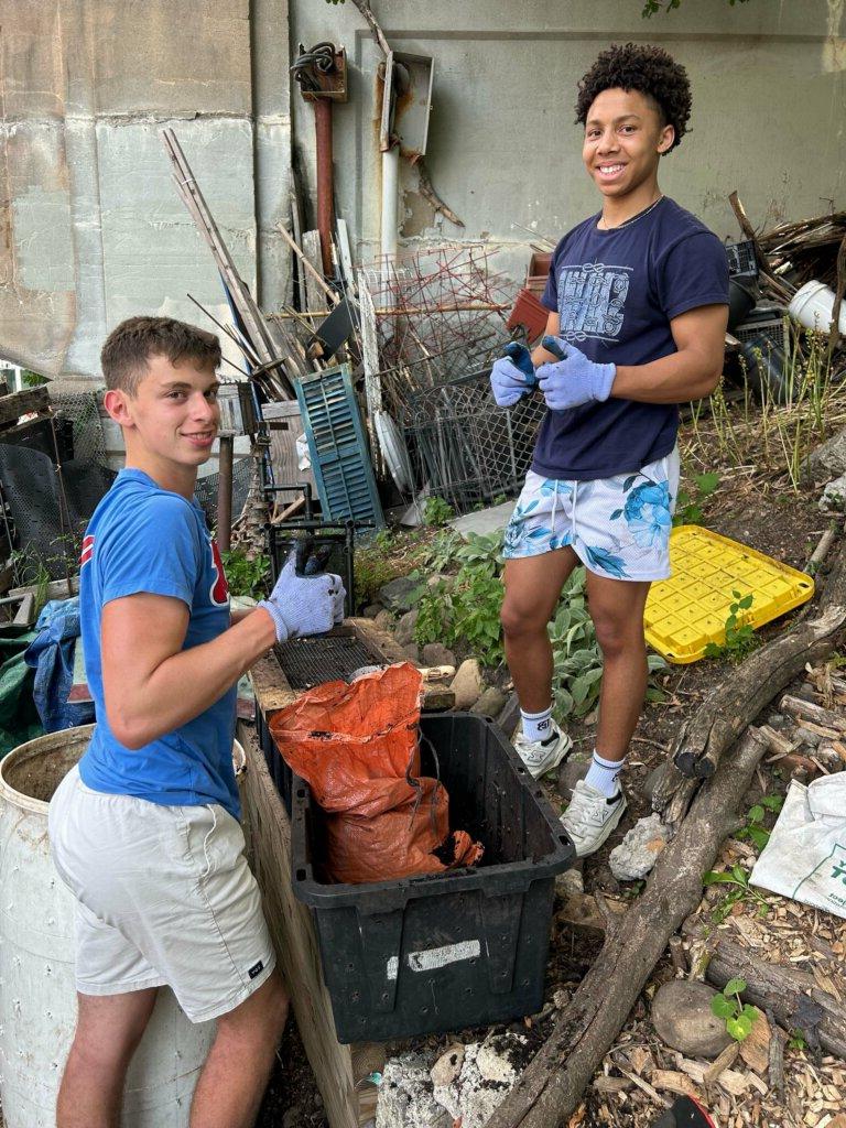 Students sifting compost at Prospect Farm.